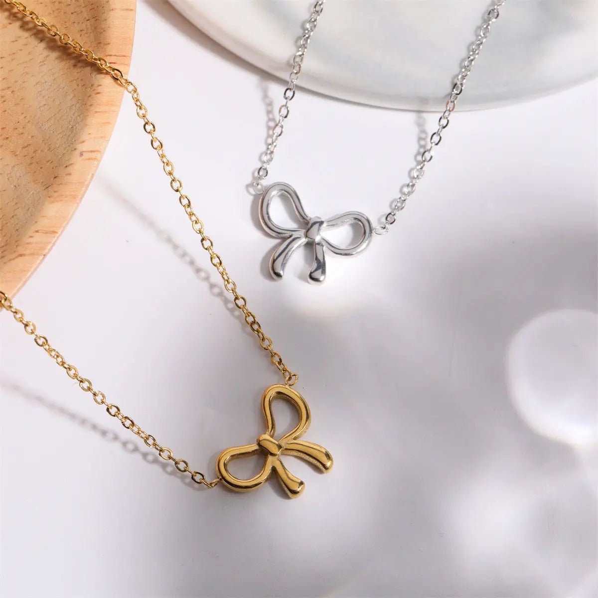 Titanium Steel Bow Pendant Necklace - GlossiChic Collection Gold / One Size GlossiChic Collection jewelry
